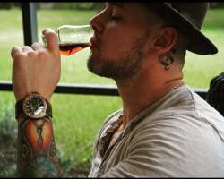 Baron Corbin consuming alcohol